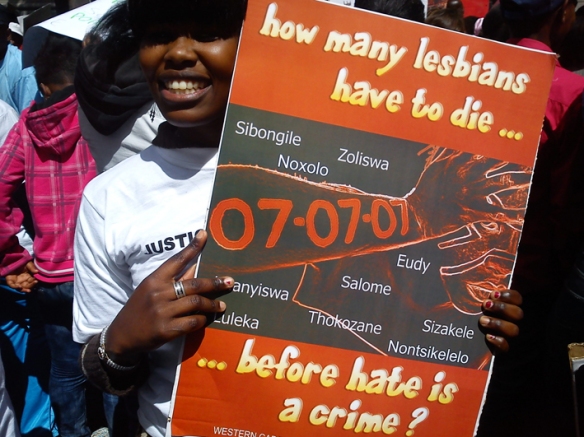 "How many lesbians have to die before hate is a crime?"